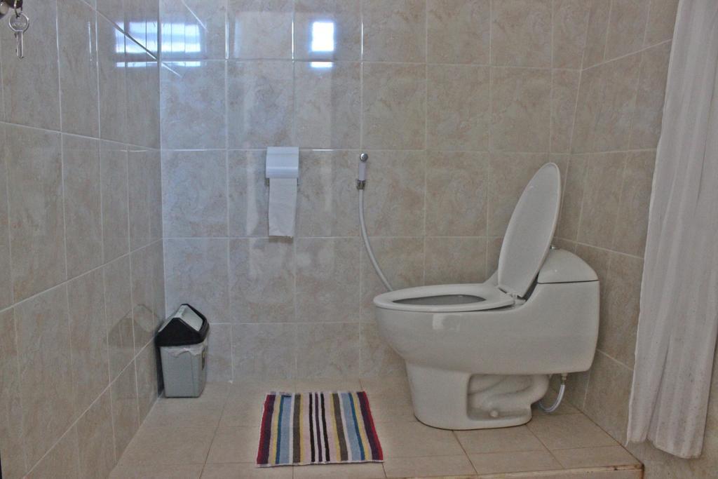 Dangin Mangkalan Homestay Мундук Номер фото